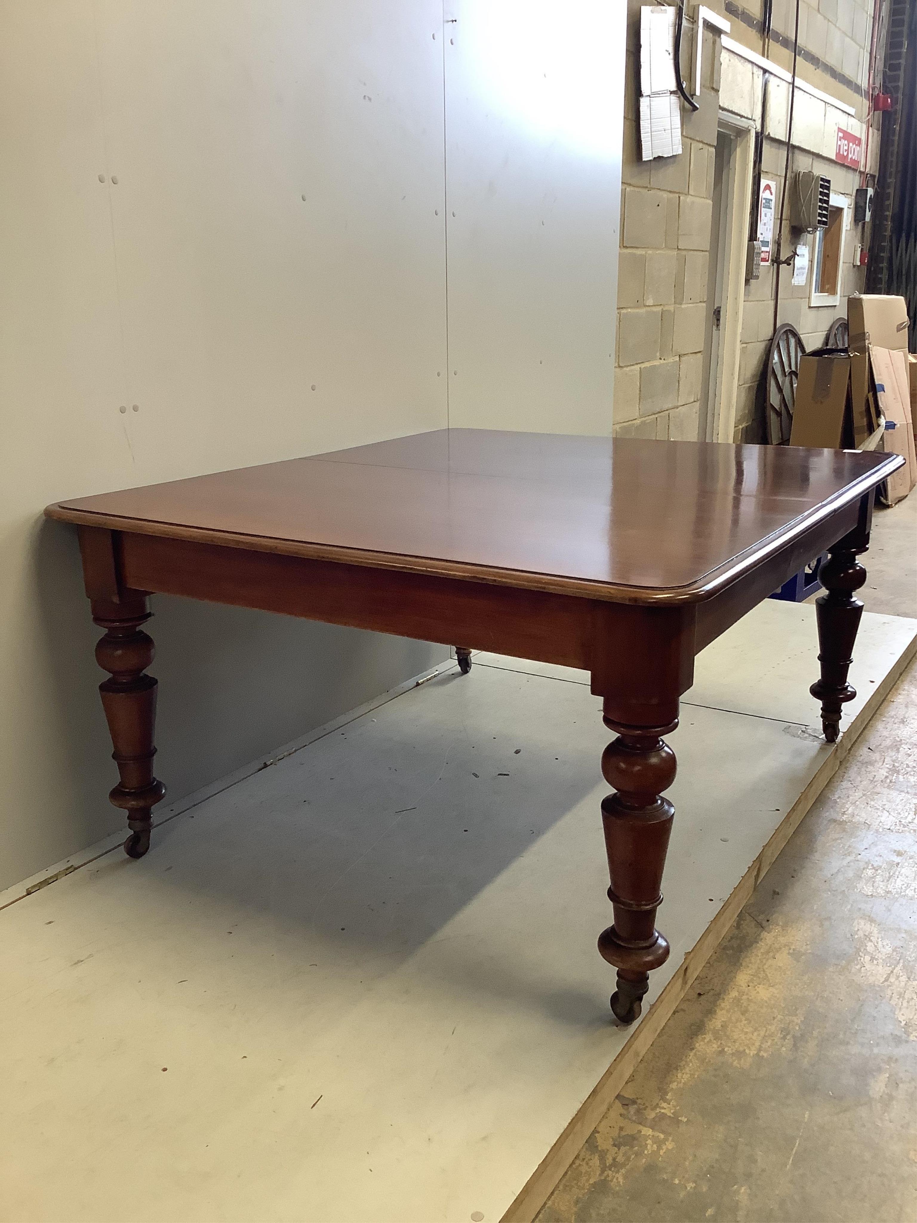 A Victorian rectangular mahogany extending dining table, 280cm extended, three spare leaves, depth 130cm, height 74cm. Condition - fair to good